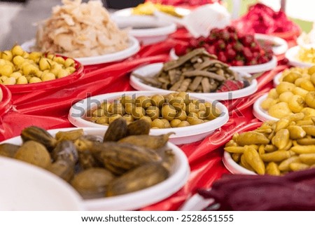 Similar – Image, Stock Photo Person mixing vegetable mixture with green spoon