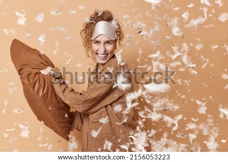 Image, Stock Photo Pillow fight girl dressed