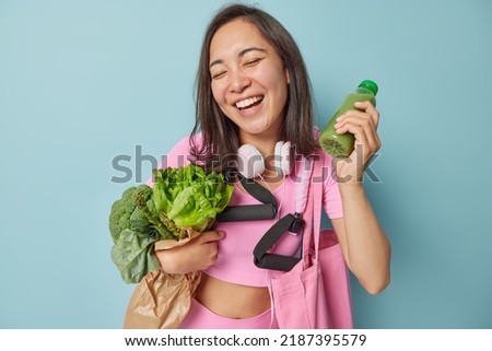 Similar – Image, Stock Photo Cheerful sportswoman smiling and looking at camera