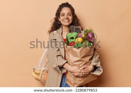 Similar – Image, Stock Photo Person with paper bag on head pointing at camera