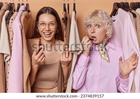 Similar – Image, Stock Photo Best female friends near lake during holiday