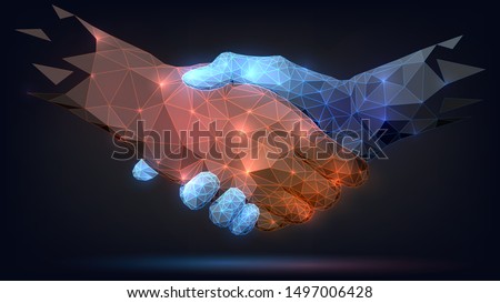 Two poligonal glowing hands, handshake, technology, business, trust concept