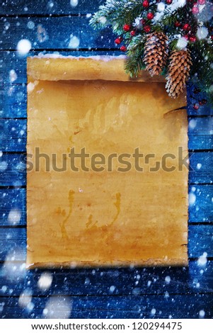 Christmas  background, snow covered old paper scroll