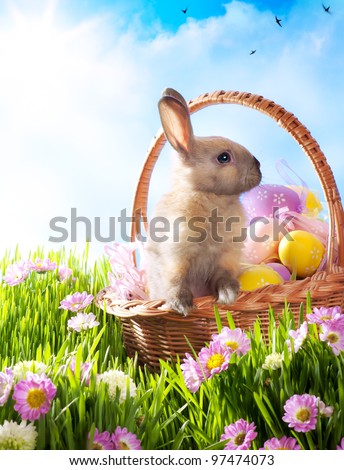Easter basket with decorated eggs and the Easter bunny