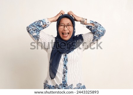 Similar – Image, Stock Photo Anxious elderly woman standing near window during pandemic