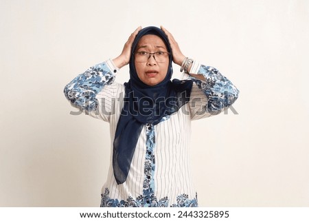 Similar – Image, Stock Photo Anxious elderly woman standing near window during pandemic