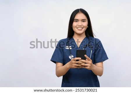 Similar – Image, Stock Photo Doctor making a phone call. Hospital staff working at night duty. Woman wearing uniform, cap and face mask to prevent virus infection