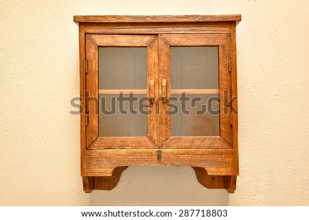 Wood and glass cabinet storage
