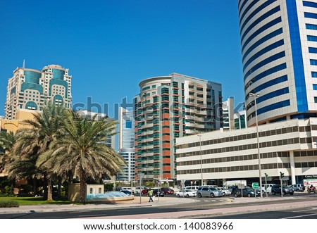DUBAI, UAE - NOVEMBER 12: Modern buildings in Dubai Marina, on November 12, 2012, Dubai, UAE. Dubai was the fastest developing city in the world between 2002 and 2008.
