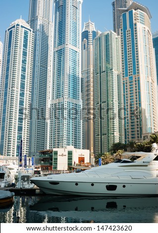 DUBAI, UAE - NOVEMBER 13: Yacht Club in Dubai Marina, on November 13, 2012, Dubai, UAE. In the city of artificial channel length of 3 kilometers along the Persian Gulf.