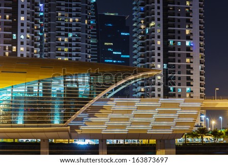 DUBAI, UAE - NOVEMBER 2: Metro subway station at night in Dubai. Metro as world\'s longest fully automated metro network (75 km) on November 2, 2013, Dubai, UAE.