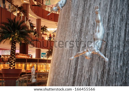 DUBAI, UAE - NOVEMBER 9: Inside modern luxuty mall on November 9, 2013 in Dubai. At over 12 million sq ft, it is the world\'s largest shopping mall based on total area.