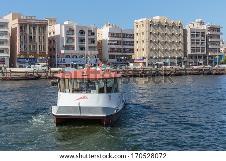 DUBAI, UAE-OCTOBER 30, 2013: Water taxi in Port Saeed in Dubai, UAE. The oldest commercial port of Dubai