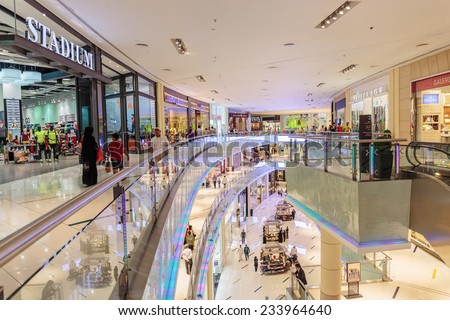 DUBAI, UAE - NOVEMBER 9: Inside modern luxuty mall on November 9, 2013 in Dubai. At over 12 million sq ft, it is the world\'s largest shopping mall based on total area.