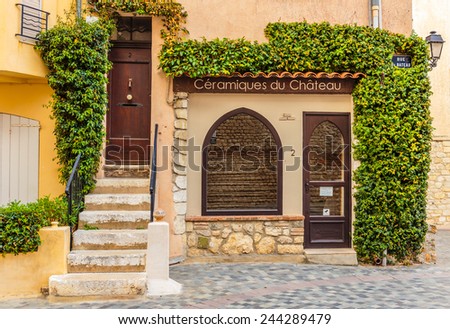 ANTIBES, FRANCE - NOVEMBER 3, 2014: Entrance to the old French house
