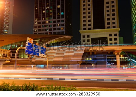 DUBAI, UAE - NOVEMBER 14, 2013: Metro subway station at night. Dubai Metro as world\'s longest fully automated metro network 75 km.