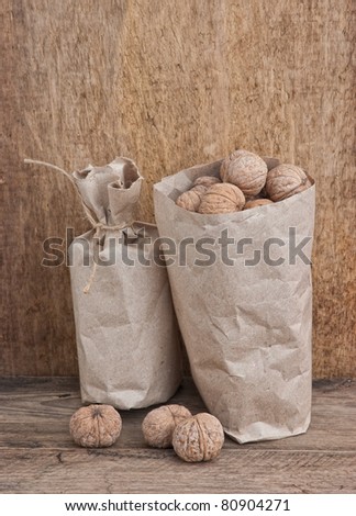 walnuts in a brown kraft paper bag