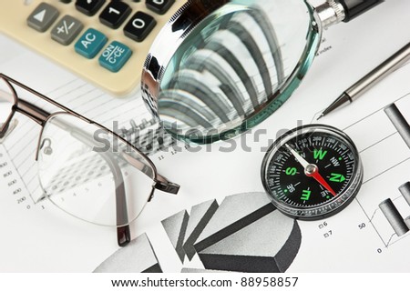 compass and working paper with  diagram