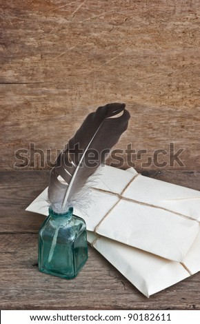 letter and a quill in the inkwell