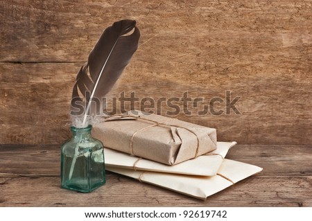 letter and a quill in the inkwell