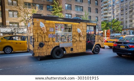 Unusual wood shingles clad ice cream truck - August 4, 2015, 2nd avenue, New York City, NY, USA