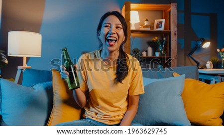 Similar – Image, Stock Photo Young woman drinking beer in a beach bar