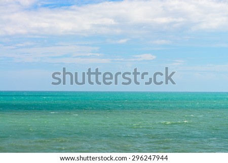 Blue sea with waves and clear blue sky. Beautiful sky and ocean. Sea summer shot