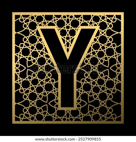 Letter Y is carved in vintage patterned square on black background. Golden monogram in vintage style.