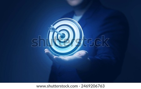 Image, Stock Photo Hold the arrow in your hands which indicates back