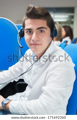 call center operator with headset smiling