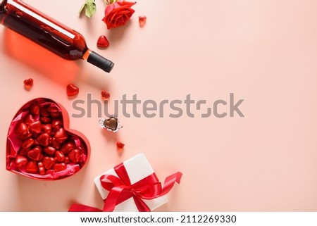 Similar – Image, Stock Photo A saint valentine mock up with colorful red hearts over a pastel blue background for the love day with copy space