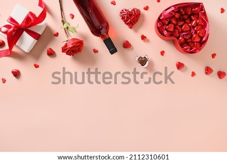 Similar – Image, Stock Photo A saint valentine mock up with colorful red hearts over a pastel blue background for the love day with copy space