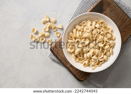 Similar – Image, Stock Photo South italian  pasta orecchiette with tomato sauce and cacioricotta cheese