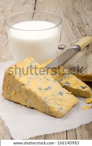 blue cheese, milk, home made bread and knife