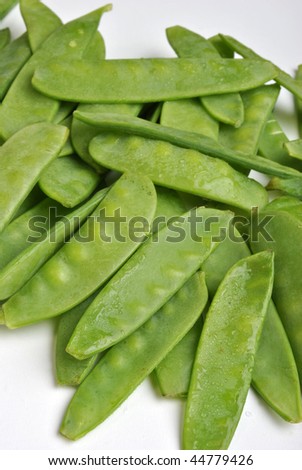 fresh organic mangetout, also known as sugar snap pea