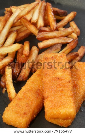 Fish fingers with chips on a pan