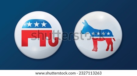 US political party affiliation buttons on a blue fabric background. Republican elephant vs Democratic donkey