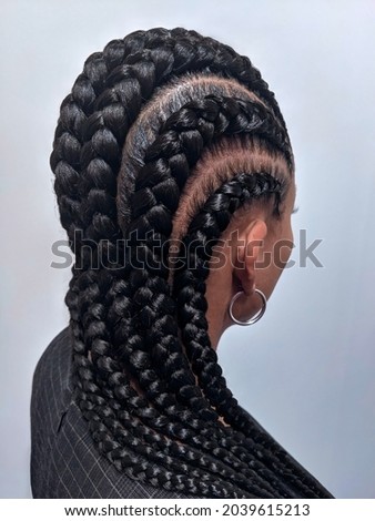 African American Women With Hair Braided Into A Cornrow Hairstyle Using Synthetic Hair Extensions Foto stock © 