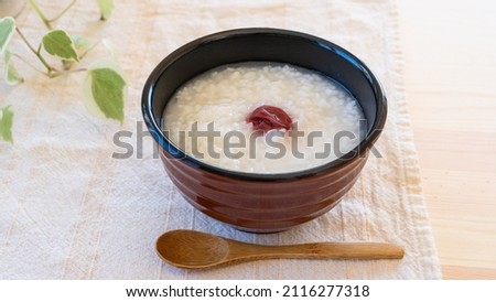 Warm salted plum rice porridge. 'Japanese Okayu' Photo stock © 