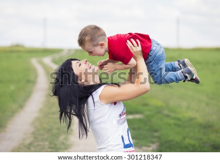 Happy mother and child hugging