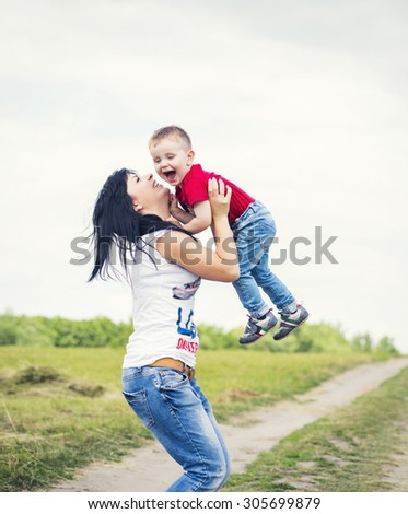 cheerful family play outdoor