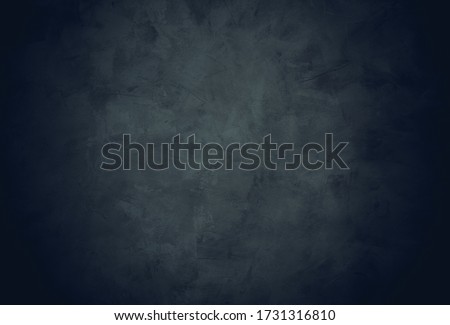 Beautiful grunge vintage black background. Abstract decorative dark background with vignette. Rough stylized texture wallpaper with copy space for design.