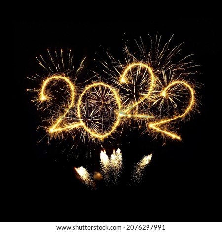 Happy New Year 2022. Sparkling burning numbers Year 2022 with firework isolated on black background. Beautiful overlay design element. Template for holiday greeting card, flyer, billboard and banner Photo stock © 