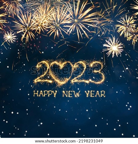 Photo of Greeting card Happy New Year 2023. Beautiful Square holiday web banner or billboard with Golden sparkling text Happy New Year 2023 written sparklers on festive blue background.