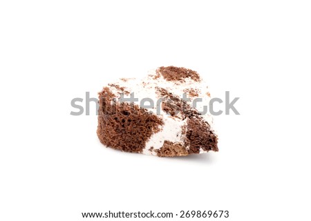 a piece of cake in the form of heart on a white background