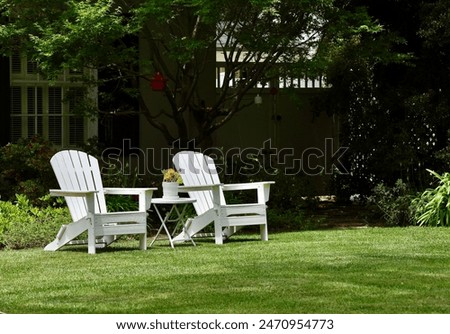 Similar – Foto Bild Grüne Gartenstühle und Tisch in einem lauschigen Garten