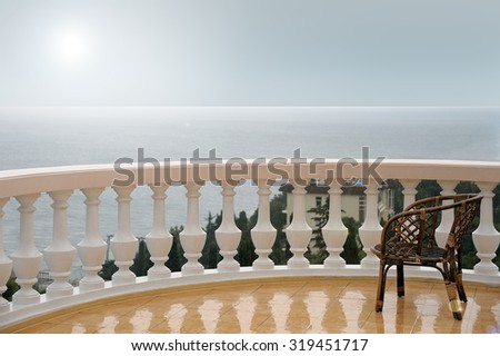 balcony / terrace on the sea during the rain / overcast