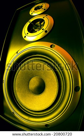 Yellow tinted audio speaker.