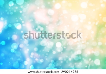 Abstract Natural Glittering Snowflake Color Pastel Yellow and Blue Bokeh Texture Background