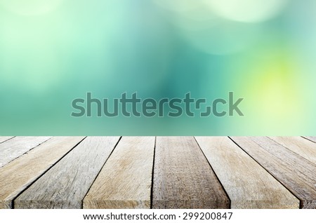 Beautiful Wooden Table Top Pastel Vintage Tone Bokeh Background For Montage or Display Your Products or Objects